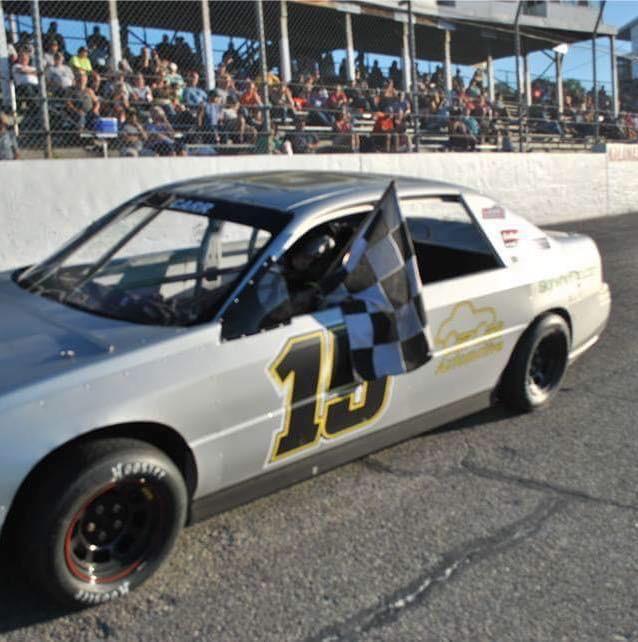Gabe celebrating a heat race win, 2018