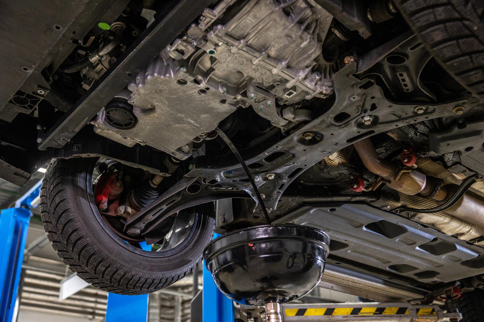 An oil change underway